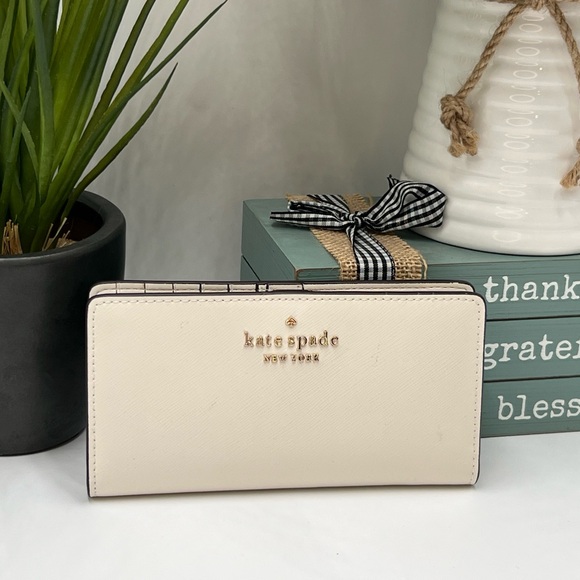 Kate Spade Staci Large Slim Bifold Wallet in Parchment